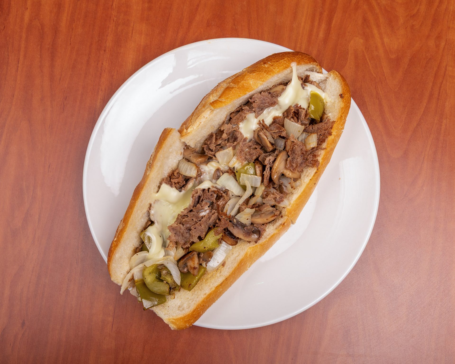 Two cheesesteaks & fries